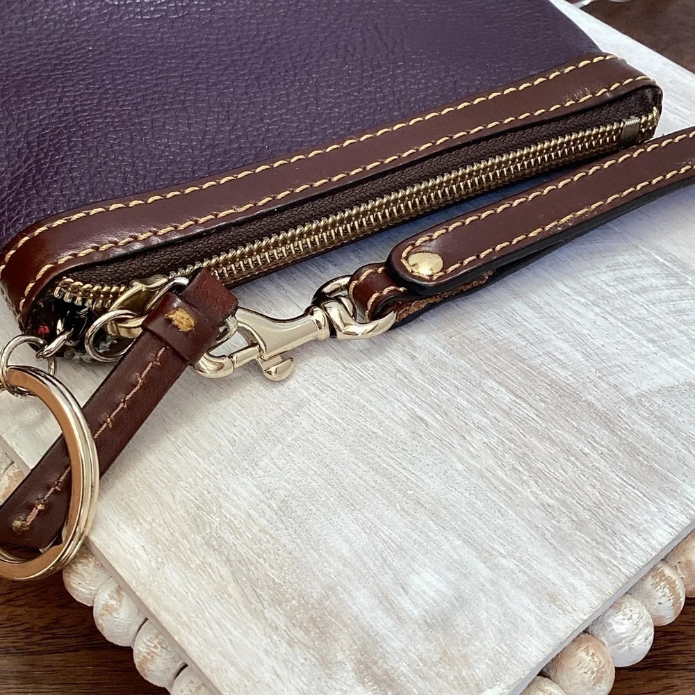Dooney & Bourke pebbled deep purple and Brown Leather Wristlet, keychain